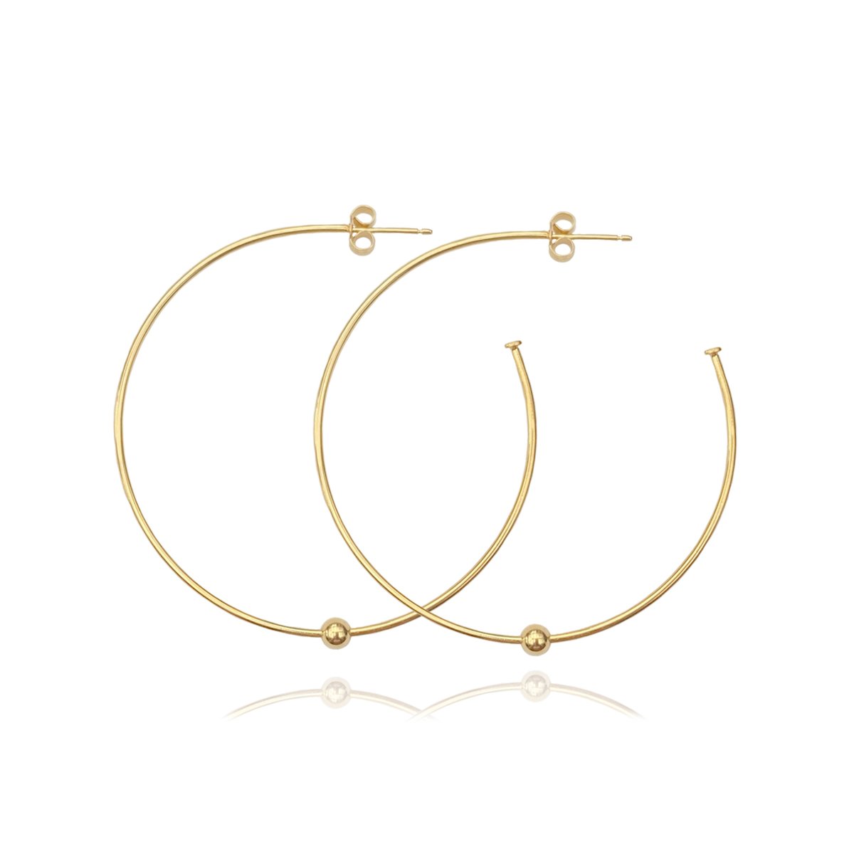 Image of Large gold hoops with a single bead