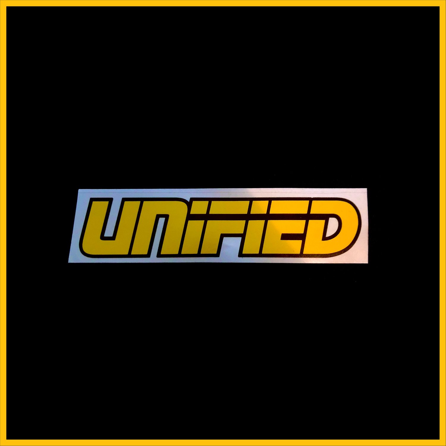 'UNIFIED' CAR WINDOW STICKER BLACK & YELLOW