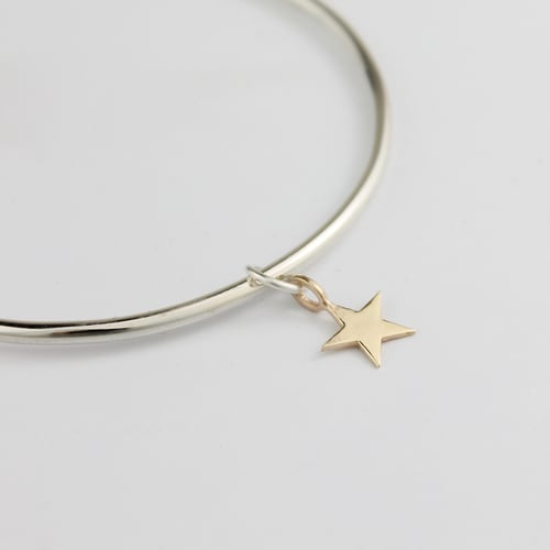 Image of Handmade silver bangle with 9ct gold five pointed star