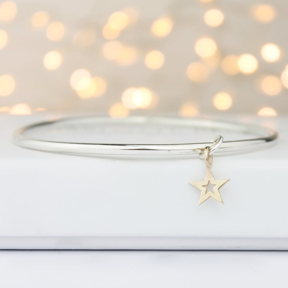 Image of Handmade silver bangle with 9ct gold star with cutout
