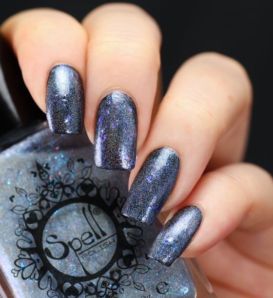 Image of ~Charlie’s Footprints~ icy blue holo flakie shimmer "Charlie Loves Bella" Spell Polish!