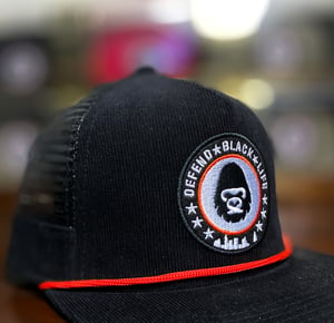 Image of Defend Black Life Trucker Hat