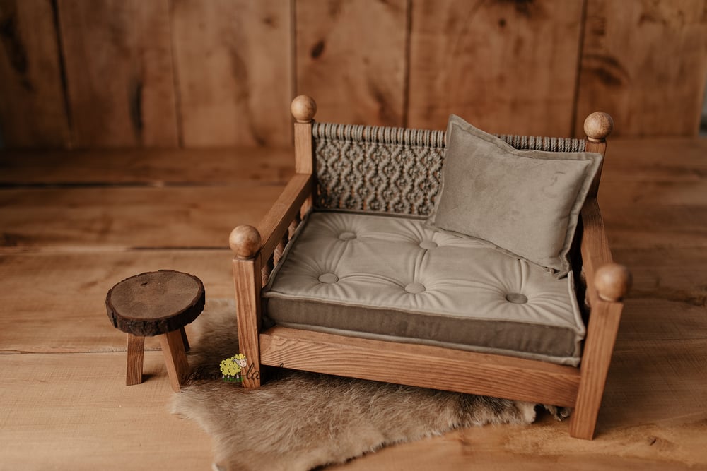 Image of « brown bench with taupe macrame nad mattress with pillow » 