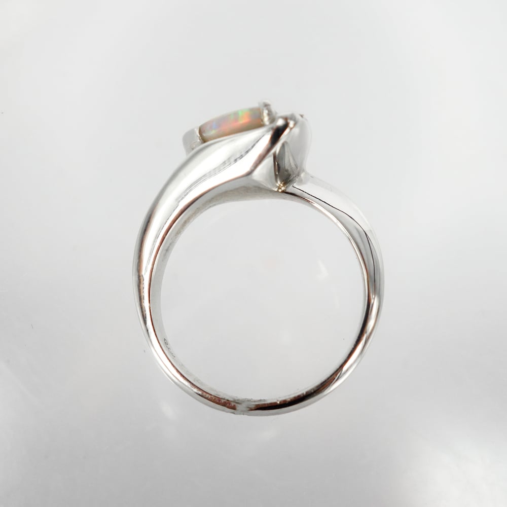 Image of Opal and diamond dress ring. pj5131