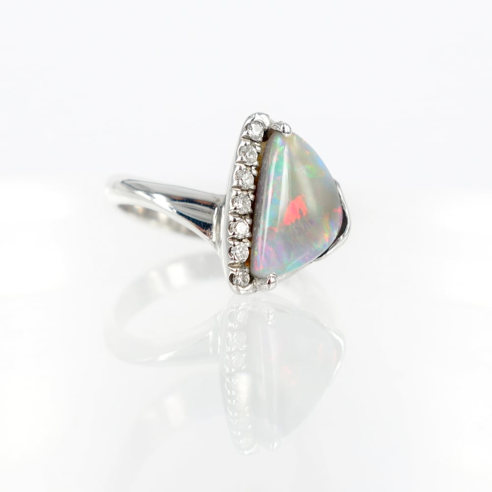 Image of Opal and diamond dress ring. pj5131