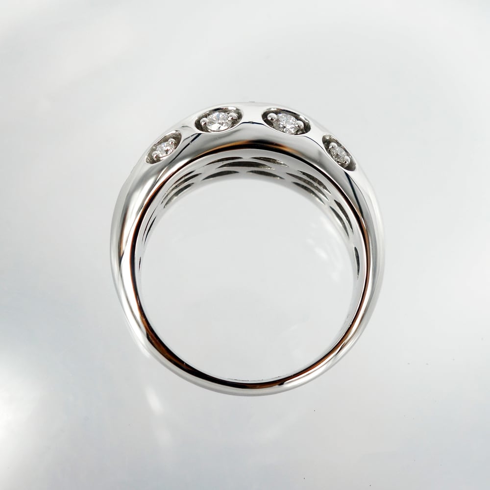 Image of 14ct white gold domed diamond set cocktail ring.      pj5458