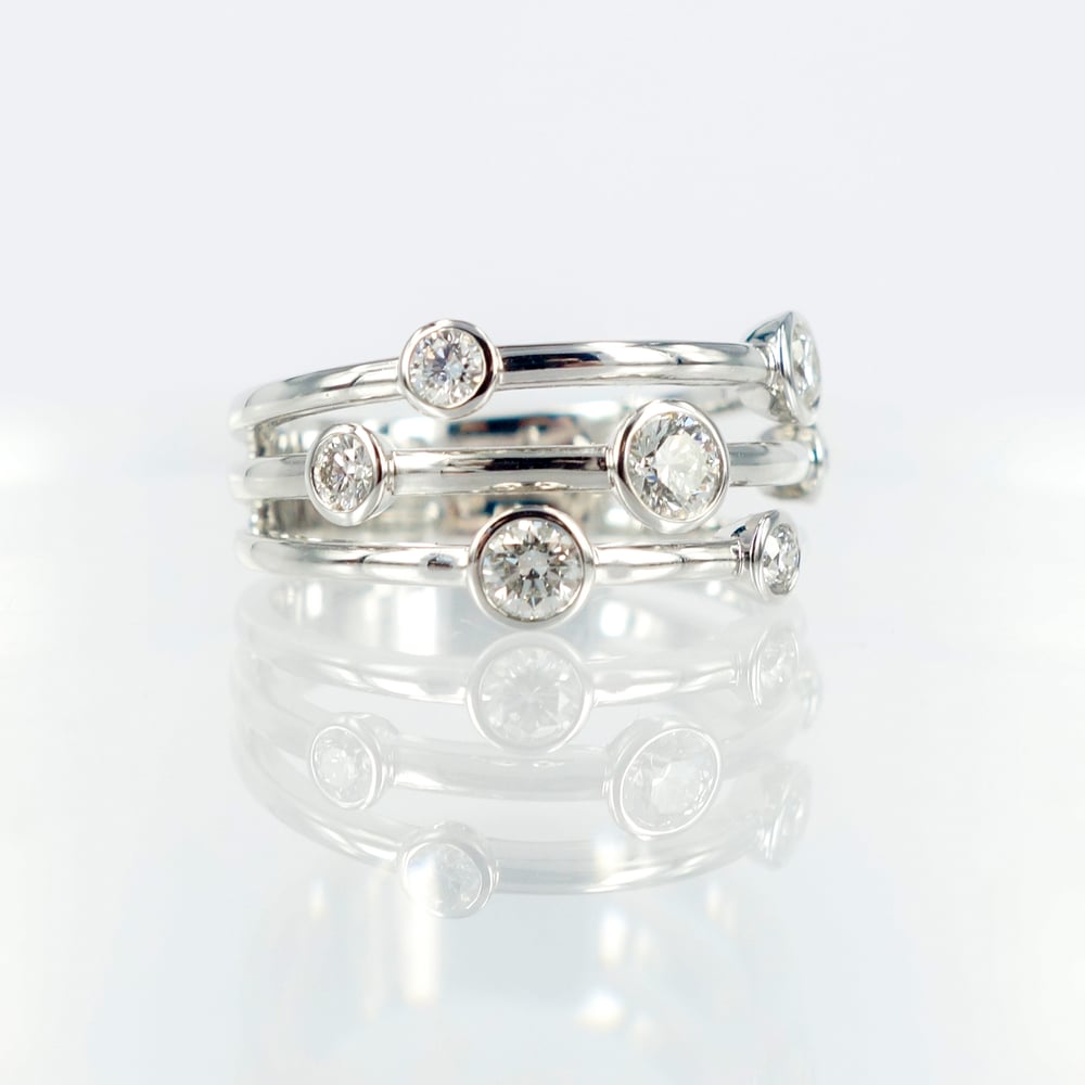 Image of White gold and diamond dress ring. Pj5661