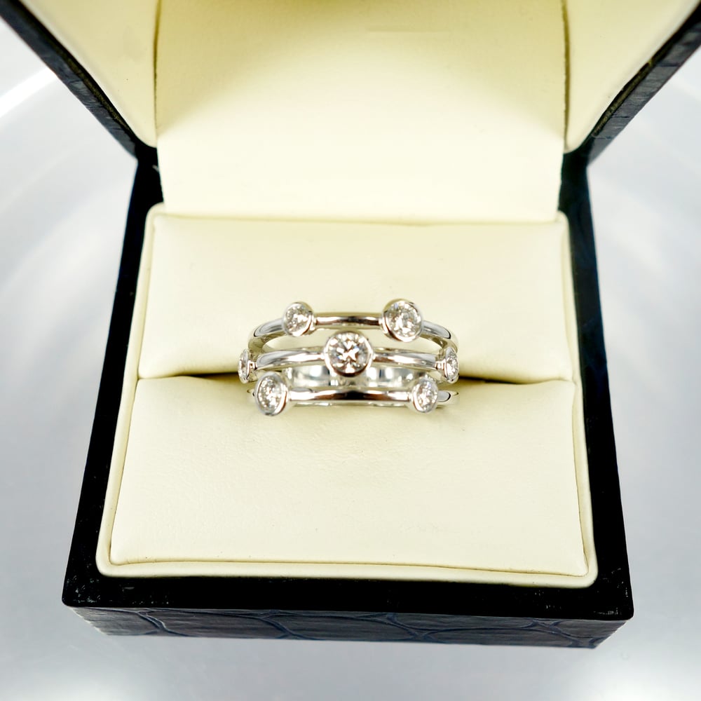 Image of White gold and diamond dress ring. Pj5661
