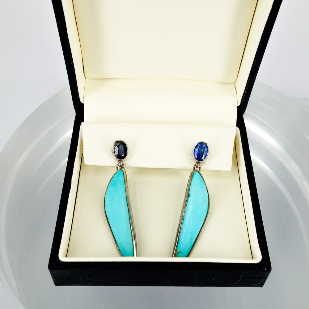 Image of Sterling silver Aztec style turquoise and topaz drop earrings.