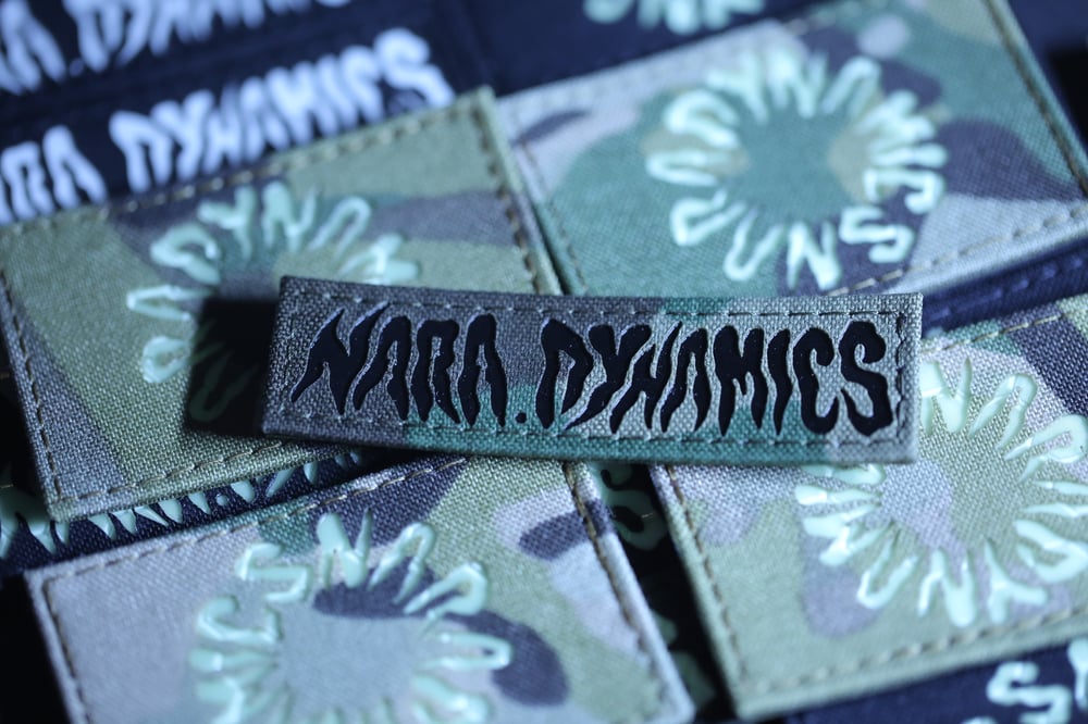 NARA WOODLAND IR MELTING LOGO