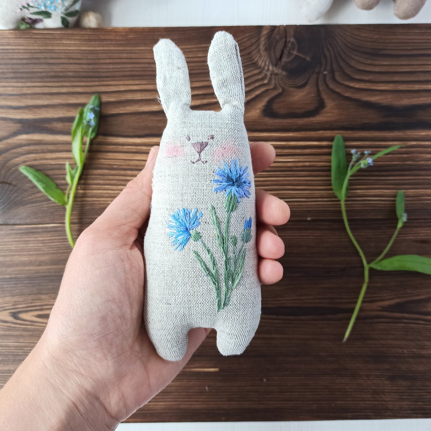 Image of Stuffed bunny with cornflower embroidery