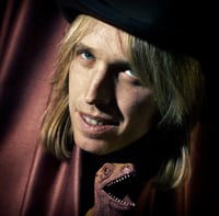 Tom Petty with dinosaur, 1988.