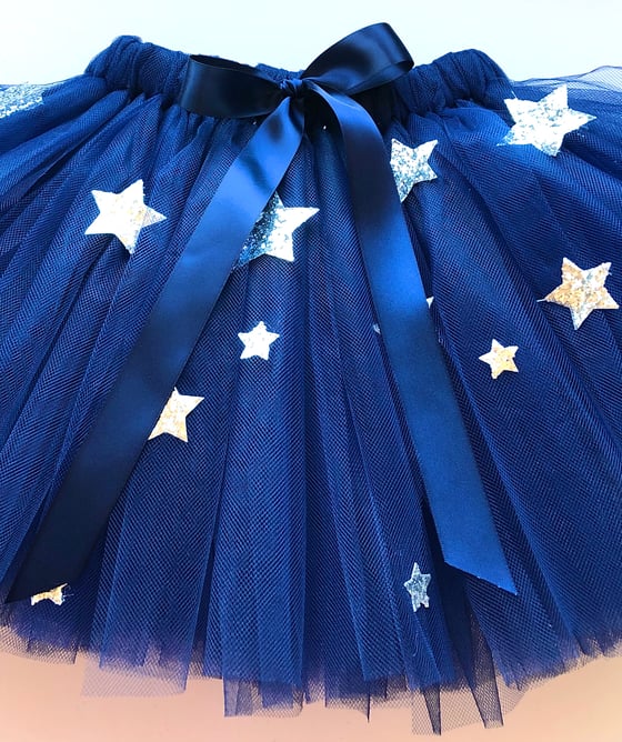Image of Navy tutu with cascading Silver stars 