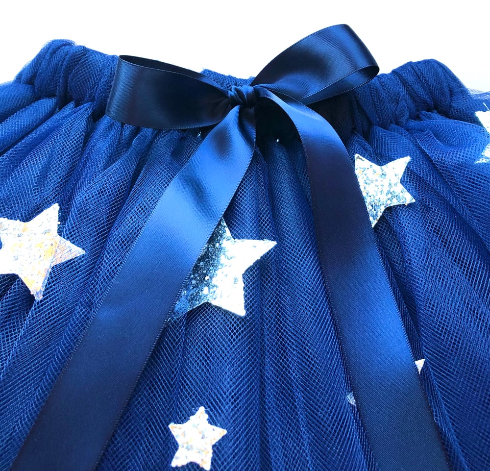 Image of Navy tutu with cascading Silver stars 
