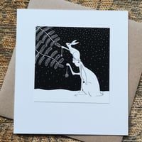 Decorating the tree hares ~ Christmas card