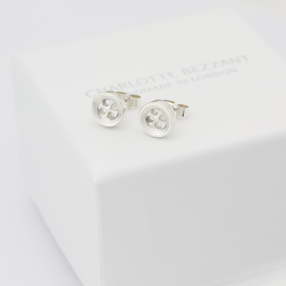 Image of small button studs, small 4 hole buttons