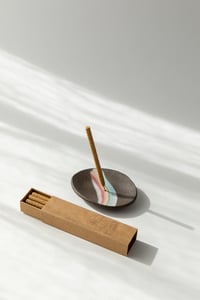 Image 1 of Rainbow over dark sky incense holders