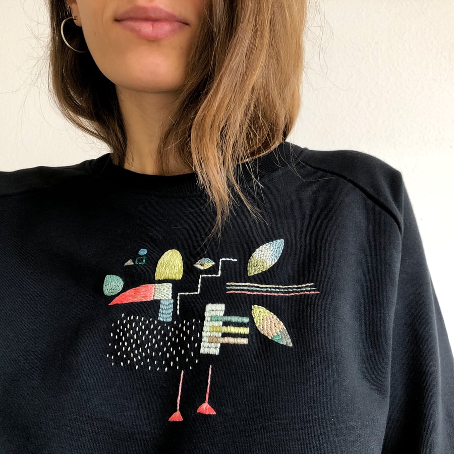 Image of A bird - original hand embroidery on organic cotton sweatshirt, one of a kind