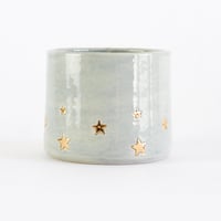 Image 1 of Golden star decorated teacup in sage green glaze