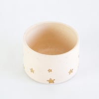 Image 2 of Golden star decorated teacup in vanilla bean glaze