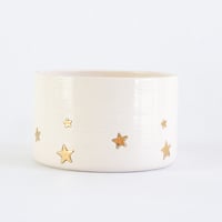 Image 1 of Golden star decorated teacup in white glaze 