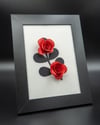 Rose a girandola in cornice