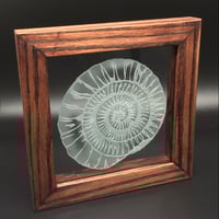 Image 1 of Freestanding frame with ammonite design