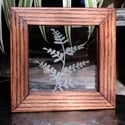 Freestanding frame with plant design