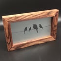 Freestanding frame with birds design