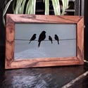 Freestanding frame with birds design