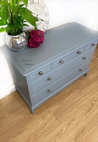 Image 2 of Stag Minstrel CHEST OF DRAWERS painted in light grey with blue tone.