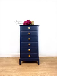Image 1 of Stag Minstrel Tallboy / Chest of Drawers painted in navy blue with gold handles 