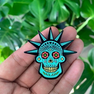 Image of STATUE OF MISERY (GLOW IN THE DARK PIN)
