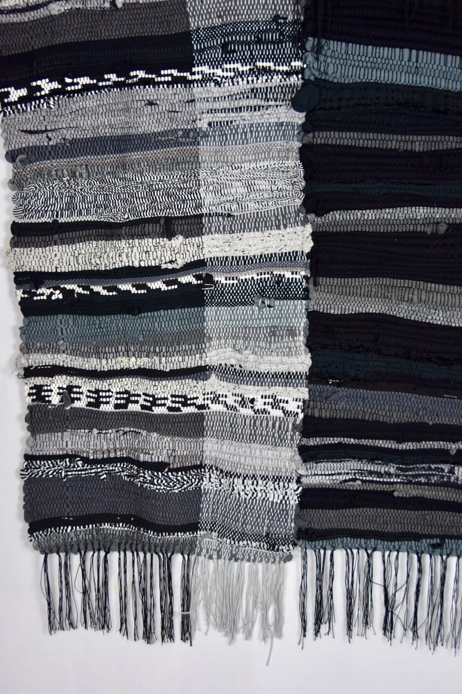 Image of Hand woven duality textile. 