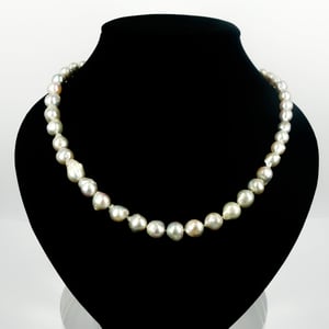 Image of Pearl strand with 14k white gold diamond set clasp. cp0274
