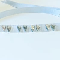 Image 2 of Irregular shaped heart studs.