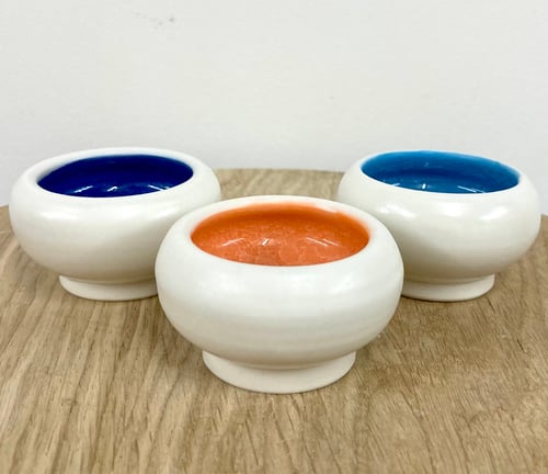 Image of Tiny Orange and White Porcelain wheel thrown bowl for salt, pepper, spice or jewellery.