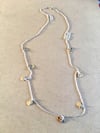 One off silver and brass tag necklace