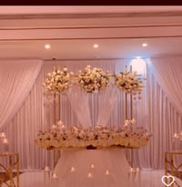 Image 1 of double violence drapeSwag with white sheer voile and flower runners. With Sweetheart Table 