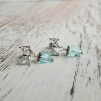 Image 2 of Tiny Aqua Bow Earrings (Silver)