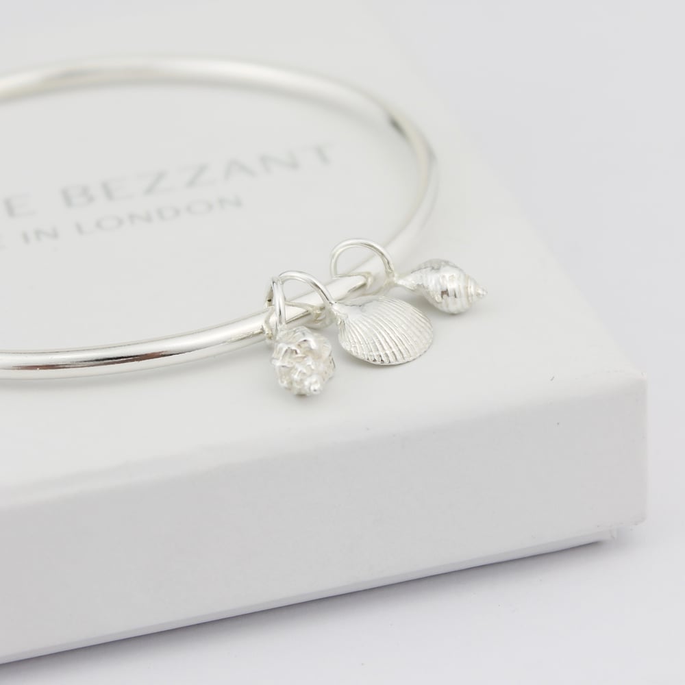 Image of silver shell bangle