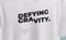 Image of T-shirt - Defying gravity