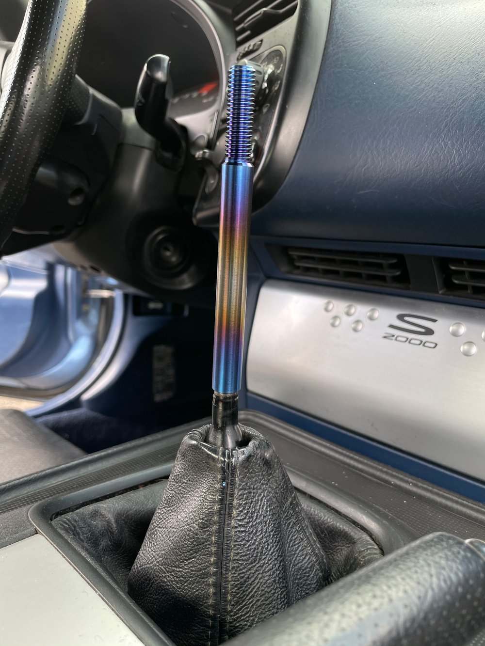 Titanium shift extension rod.