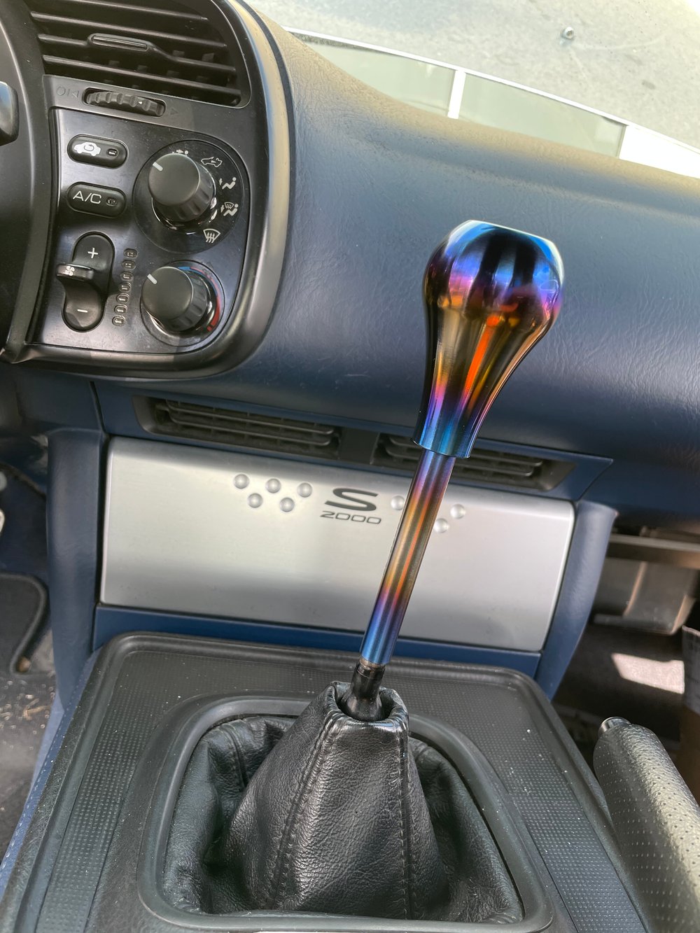 Titanium shift extension rod.