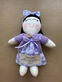 Muñeca Kristelita - Tono lavanda.