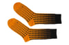 PARADIGMA orange socks, by Thijs Verhaar