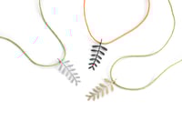 Mimosa pendant on silk cord