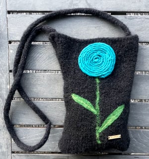 Image of Cross body black hand knit and felted bag. 