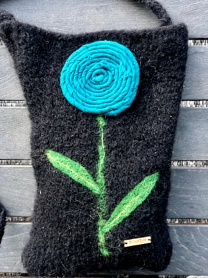 Image of Cross body black hand knit and felted bag. 