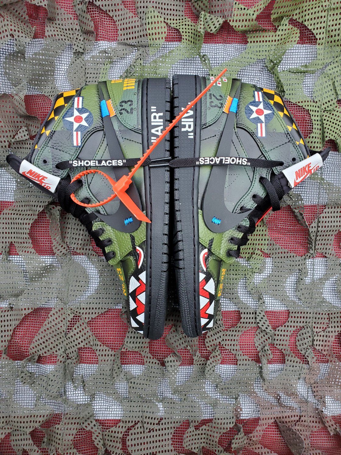 Image of Off-White Jordan 1 Blackhawk